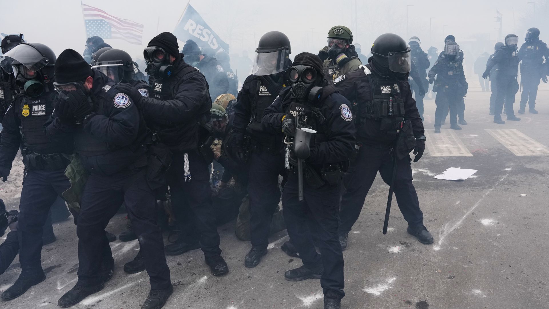 Watch: Sky correspondent struggles to speak as tear gas fired at ICE protesters